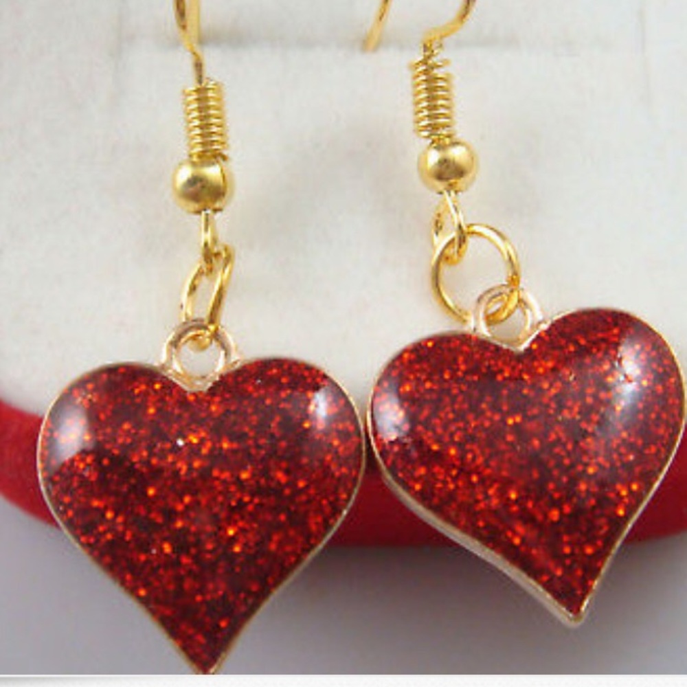 Red glitter heart shaped earrings